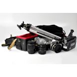 A cased Nikon camera, a cased cine camera and a tripod (3).