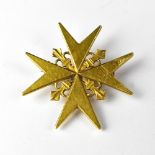 A yellow metal Maltese Cross brooch with pin and necklace hoop, width 3.5cm, approx 7.2g.