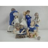 ROYAL COPENHAGEN (BING & GRONDAHL); five groups of porcelain figures, each depicting children,