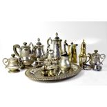 A quantity of silver plated items to include an embossed three-piece tea service with matching oval