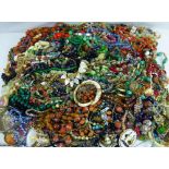 A large quantity of modern, vintage and possibly antique necklaces and bracelets.