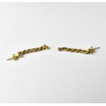 A pair of 9ct yellow and white gold twist earring drops, length of drop approx 3cm,