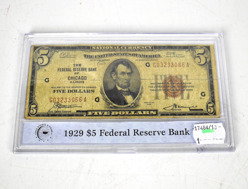 A United States of America 5 dollar Federal Reserve banknote issued by Chicago Illinois, no.