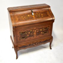 A reproduction Italian marquetry inlaid bureau with hinged fall front above two long drawers,