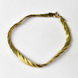 A 9ct gold flat three-strand braided bracelet, length approx 18cm, approx 3.8g.