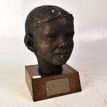 SAMUEL TONKISS; plaster bust of 'Nigel', dated 'Jan 1960', mounted on a wooden base with a plaque,