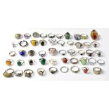 Approximately fifty silver toned fashion rings (approx 50).