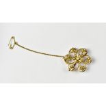 An Edwardian 9ct gold open floral brooch with tiny seed pearls to the flowers and leaves,