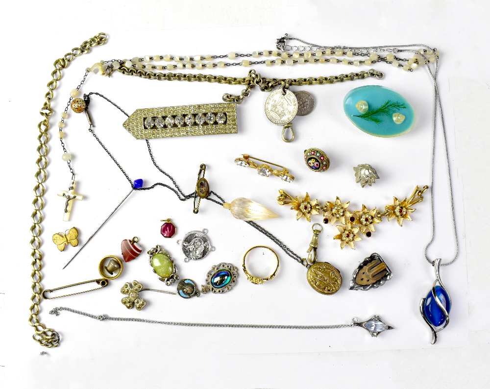 A quantity of jewellery to include a watch chain, etc.