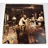 LED ZEPPELIN; LP 'In Through The Out Door', with outer brown paper sleeve, bearing signatures.