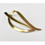 A 9ct gold contemporary-style leaf brooch, length 6cm, approx 4.1g.