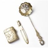 A hallmarked silver vesta, repoussé decorated with lily of the valley flowers,