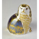 ROYAL CROWN DERBY; a paperweight 'King Charles Spaniel', with gold plug.