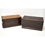 Two vintage dark stained pine blanket boxes, with hinged lid and twin carry handles,