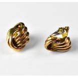 A pair of 9ct gold knot-shaped clip-on earrings, length approx 2cm, combined approx 7.6g.