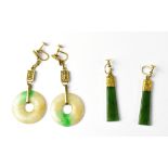 A pair of jade circular drop earrings and a pair of spinach green jade drop earrings with engraved