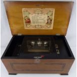 A 19th century Swiss three-bell music box playing ten airs,