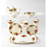 ROYAL ALBERT; a quantity of 'Old Country Roses' tea and dinner ware to include dinner plates,
