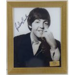 SIR PAUL MCCARTNEY; a photograph of a young Paul McCartney,
