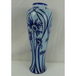 MOORCROFT; a large baluster-shaped vase in the 'Ragged Poppy' design,