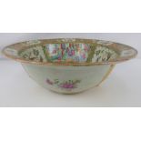 A large 19th century Chinese Canton-style Famille Rose deep bowl,