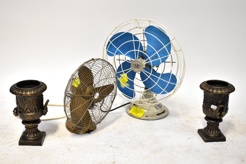 A vintage metal desk fan, height 35cm, another larger example by Limit, with blue blades,