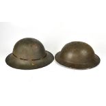 Two WWII Brodie type helmets (2).