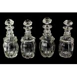 A set of four 19th century cut glass decanters with double rings to the neck and octagonal baluster