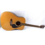 YAMAHA; an F-310 Model acoustic guitar.
