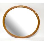 An Edwardian satin walnut and line inlaid oval wall mirror with bevelled plate, 96 x 107cm.