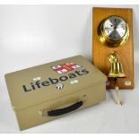 A modern brass ship's clock by Ansty Wilson England, with silvered dial,