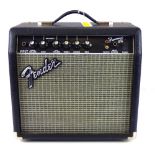 FENDER; a Frontman 15G portable amp, 33 x 34 x 19cm.