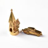 Two 9ct gold charms, one depicting a church with spire, height approx 3.