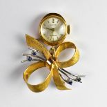 MARVIN; a ladies' upside down fob watch, the silvered dial set with raised baton numerals,