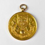 A 9ct gold hallmarked Preston & District Amateur League 'Guildhall Cup Winners 1924-5' prize