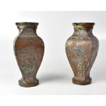 A pair of early 20th century bronze vases with raised floral, bird and insect decoration,