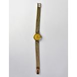 TISSOT; a ladies' vintage 9ct gold wristwatch,