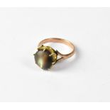 A Victorian rose gold ring with black pearl in claw mount, on split shoulders, size O, approx 4g,