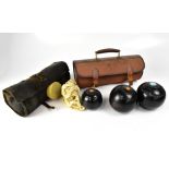 Two cased sets of bowling woods,