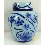 MOORCROFT; a modern 'Midnight' pattern ginger jar with blue floral pattern, on a light blue ground,