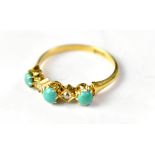 An 18ct gold ring with three turquoise beads separated with two bezel set tiny diamonds, size Q,