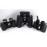 Three pairs of mostly modern binoculars to include Boots Ascot 10x50, in black case,