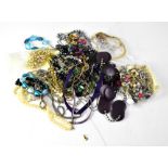 A quantity of costume jewellery to include bead necklaces, crystal-effect necklaces, earrings,