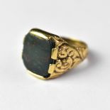 A gentlemen's 9ct gold square set goldstone signet ring, with bloodstone top,