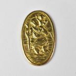 A 9ct gold oval tablet depicting St Christopher to the front, length approx 3cm, approx 5.8g.