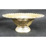 A George V hallmarked silver small tapered dish with serrated beaded edge on tapered flared body,
