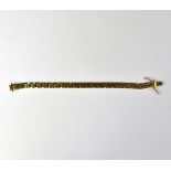 A 9ct gold bracelet with flat interlocking links and box clasp, length 18cm, approx 15.1g.