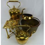 Two 19th century brass kettles with tubular handles, acorn finials and fishtail joints,