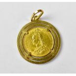 A Victorian Jubilee Head full sovereign 1887 in a necklace pendant mount, approx 14.7g.