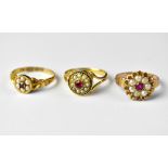 Three red stone and seed pearl cluster rings comprising a 15ct gold example, size N, approx 1.